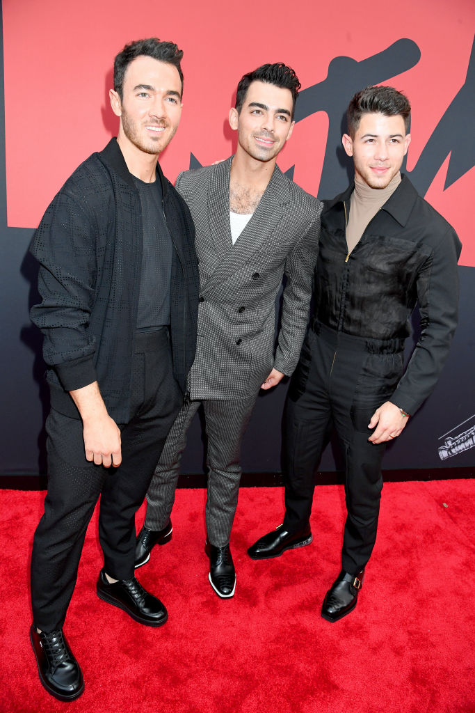 Kevin Jonas, Joe Jonas, and Nick Jonas attend the 2019 MTV Video Music Awards at Prudential Center on August 26, 2019 in Newark, New Jersey. (Photo by Jeff Kravitz/FilmMagic)